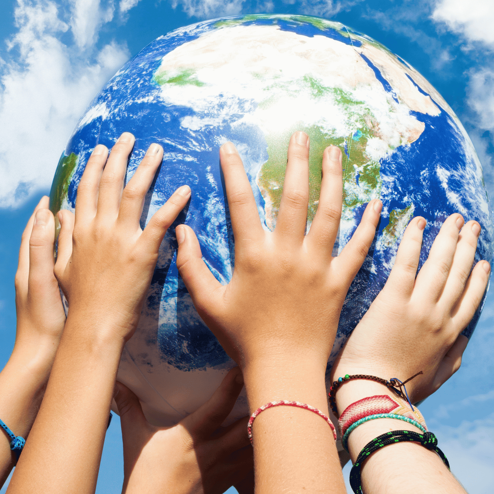 Hands holding up the earth to represent a collective change in our we use comments sections on the internet
